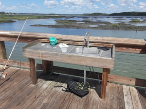 fish cleaning table at squire park pier